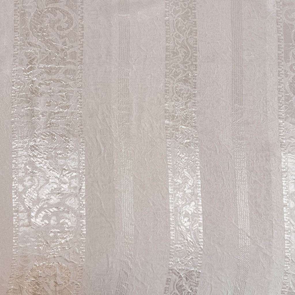Lett transparent med ornamentstriper