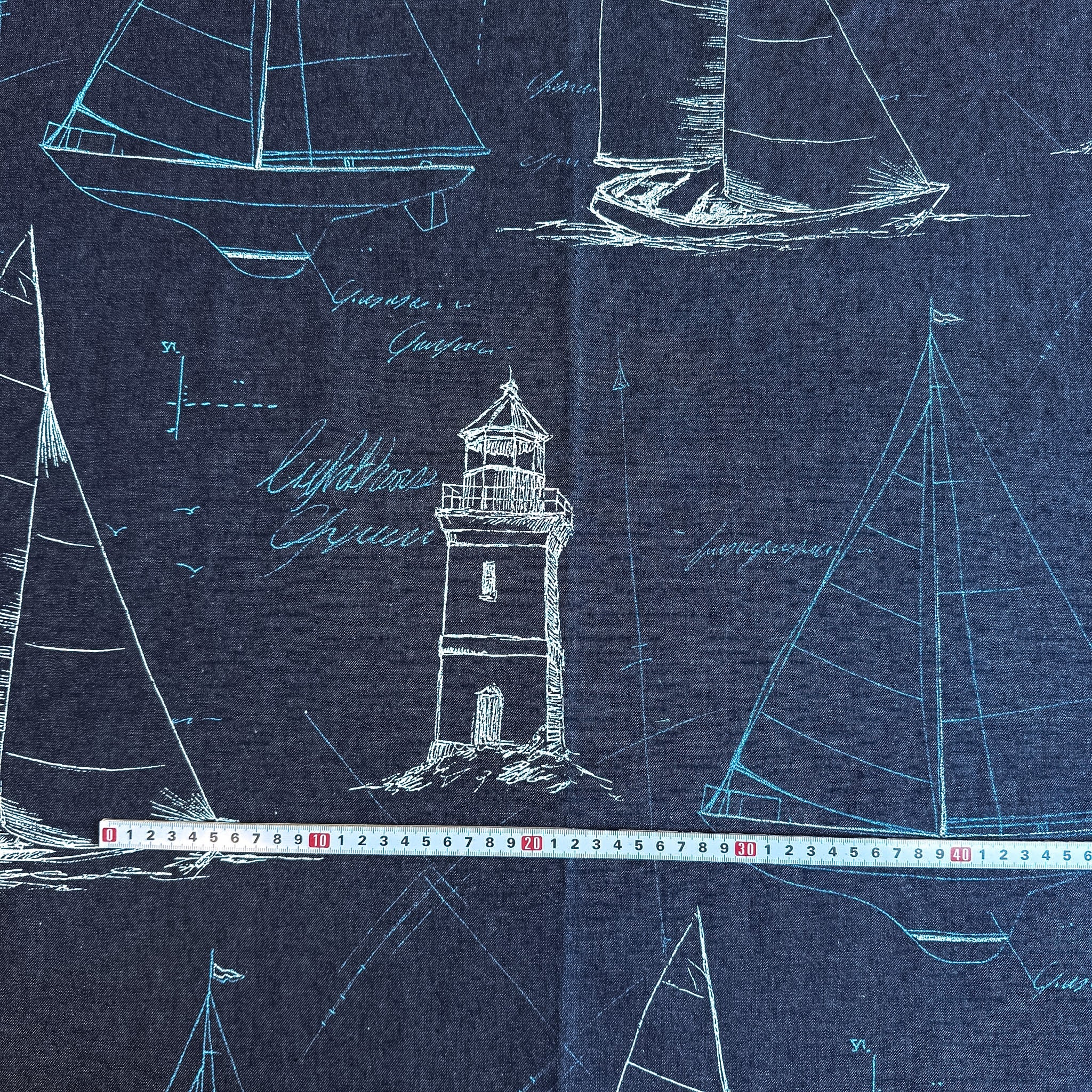 Denim med maritime tegninger